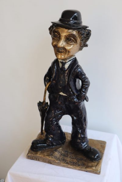 Charlie Chaplin   A day without a smile is a wasted day. Bronze ,     H-50 ,     27/17